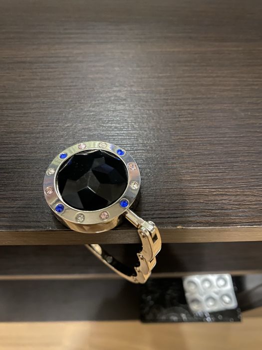 Компактний сумкотримач