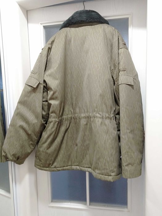 kolekcjonerska Kurtka zimowa NVA "deszczyk" rozm.62-Duża stan magazyn