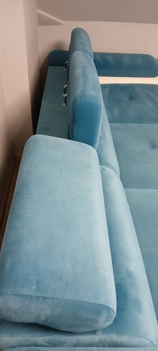 Kanapa rogówka z funkcją spania i pojemnikiem