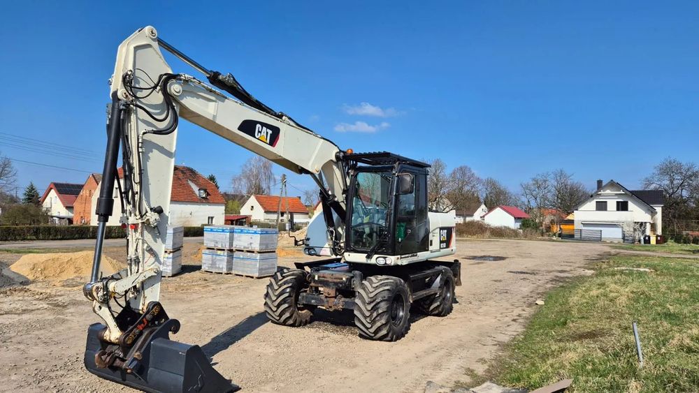 Caterpillar M 316 D  koparka kolowa Cat M 316 D sprowadzona gotowa do pracy .