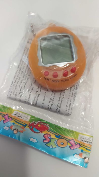 Іграшка тамагочі tamagochi ностальгія брелок 90х