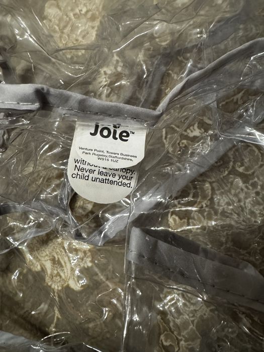 Дощовик Joie є ще сумка і адаптери