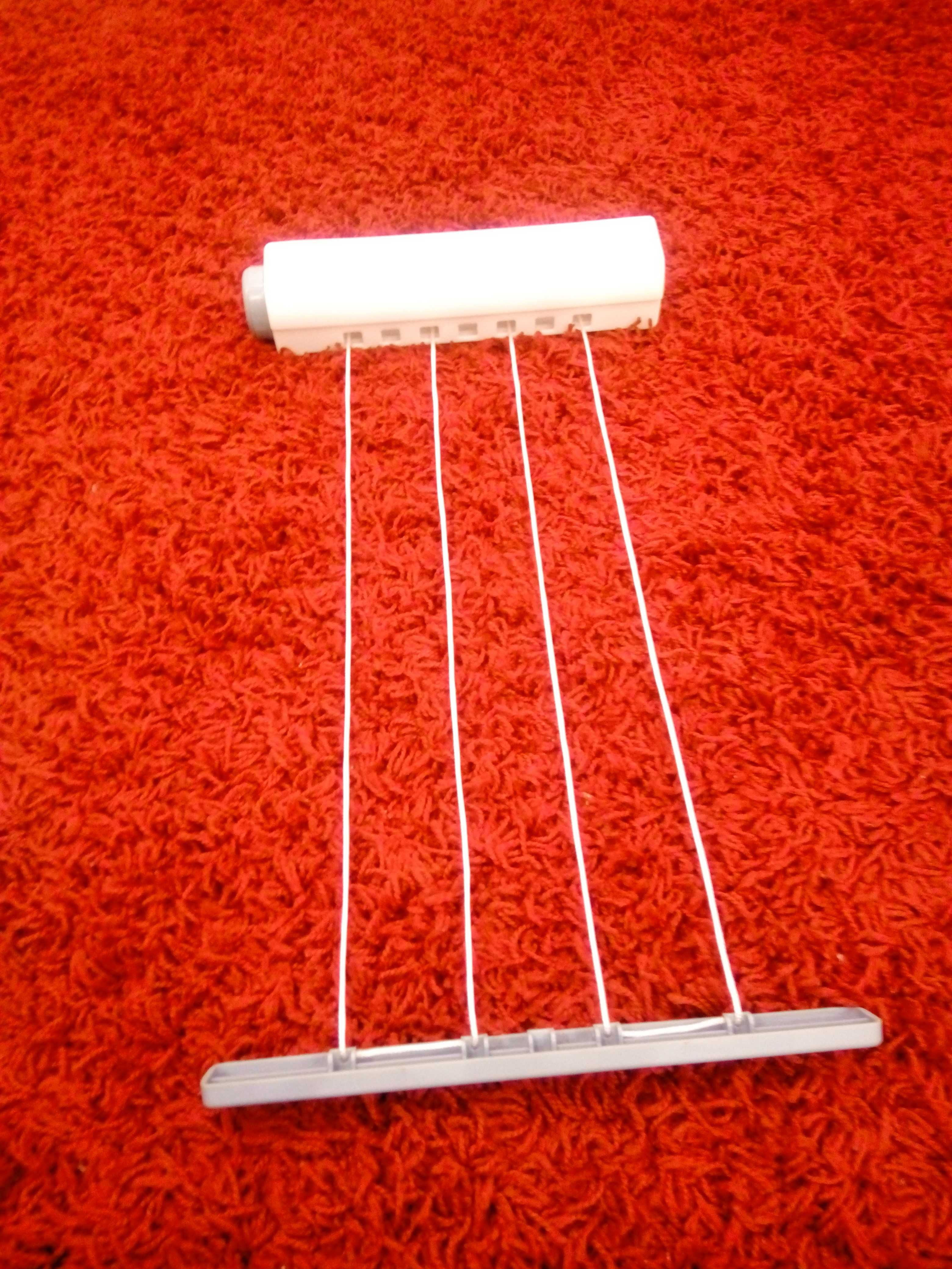 Білизняна мотузка для ванної кімнати