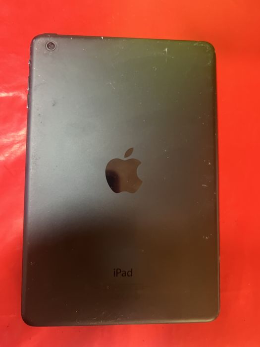 Mini ipad com carregador nao sai palavra passe