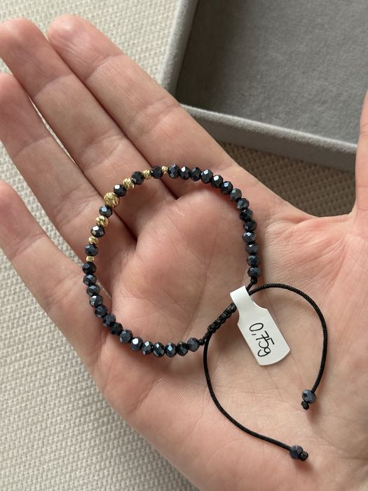 Bransoletka na rzemyku z elementami złota, granatowe kamienie 585