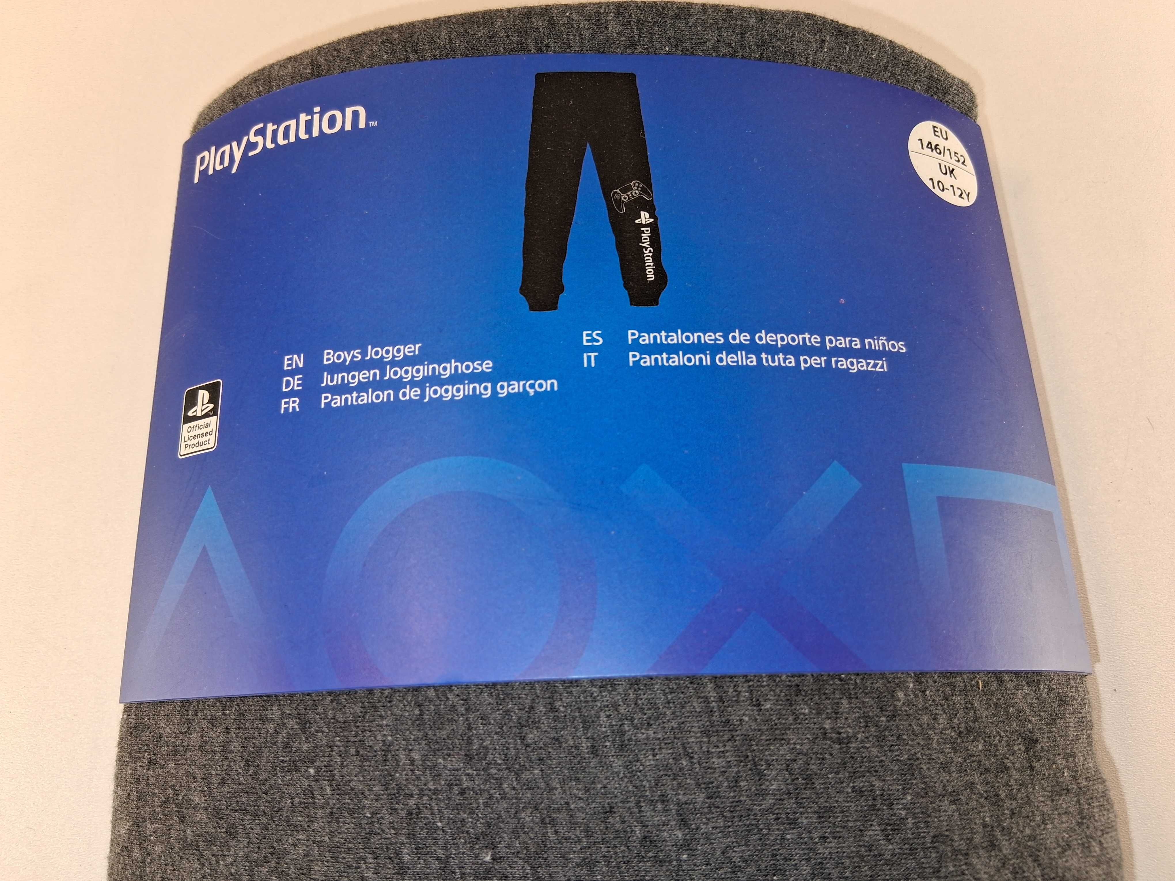 A135 Spodnie Dresowe Chłopięce Sony PlayStation Szare Rozm. 146/152