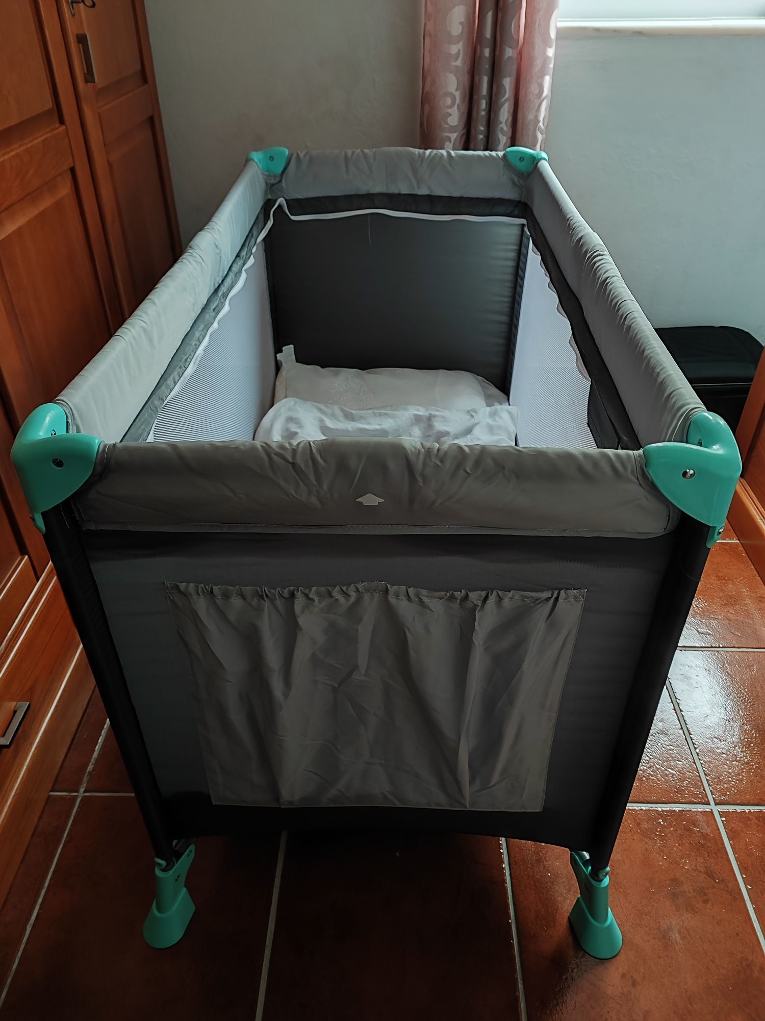 Cama de viagem com redutor