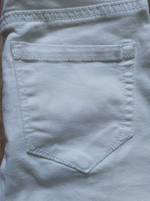 Рвані фірмові джинси 32р.