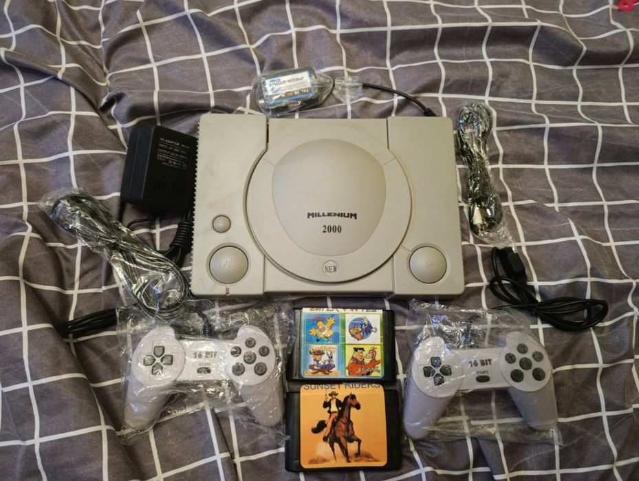 Приставка SeGa Milenium 2000 с  картриджами  новая!