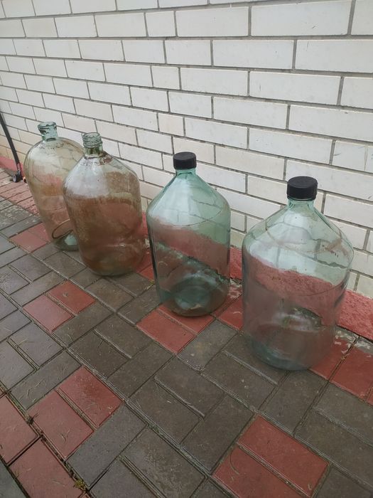 Бутлі стікляні об'єм двадцять п'ять літрів