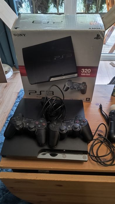 Konsola PS3 z padem, kamerka i padami do sportu