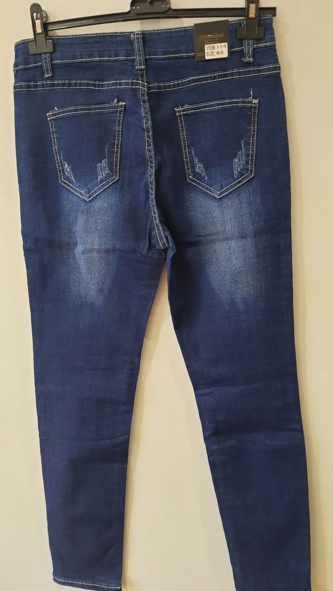 Nowe granatowe jeansy 40