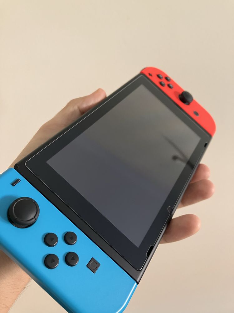 Nintendo Switch com jogos e acessórios