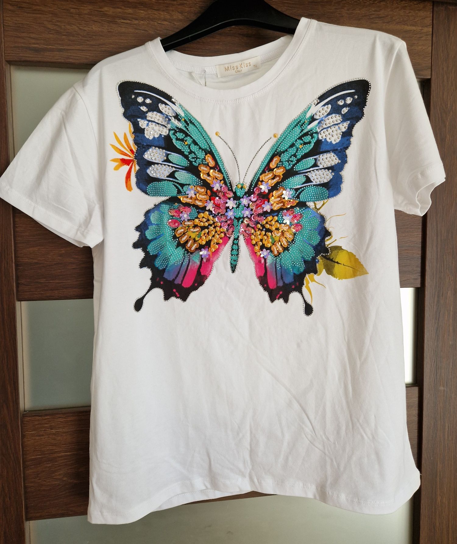 Sprzedam bluzkę damską T-shirt Nowy Uni