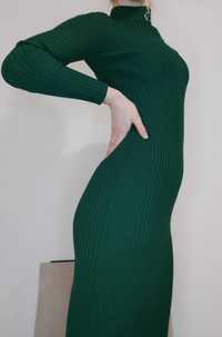 Стильна трикотажна сукня в рубчик