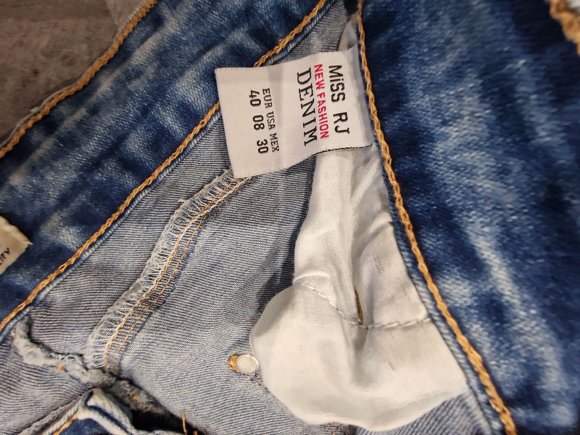 Spodnie jeansy L