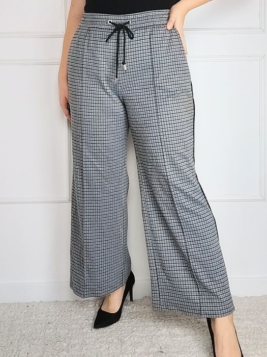 Szare spodnie z szerokimi nogawkami plus size 46