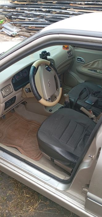 Чері Амулет                   .