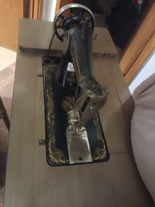 Máquina de costura singer antiga