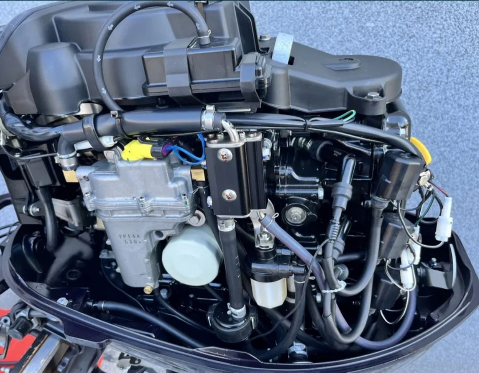 Tohatsu  MFS 30 CS. Лодочний мотор Тохатсу 30.