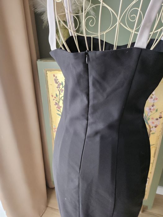 Elegancka sukienka damska midi  Mohito z kokardą i wycięciem wesele