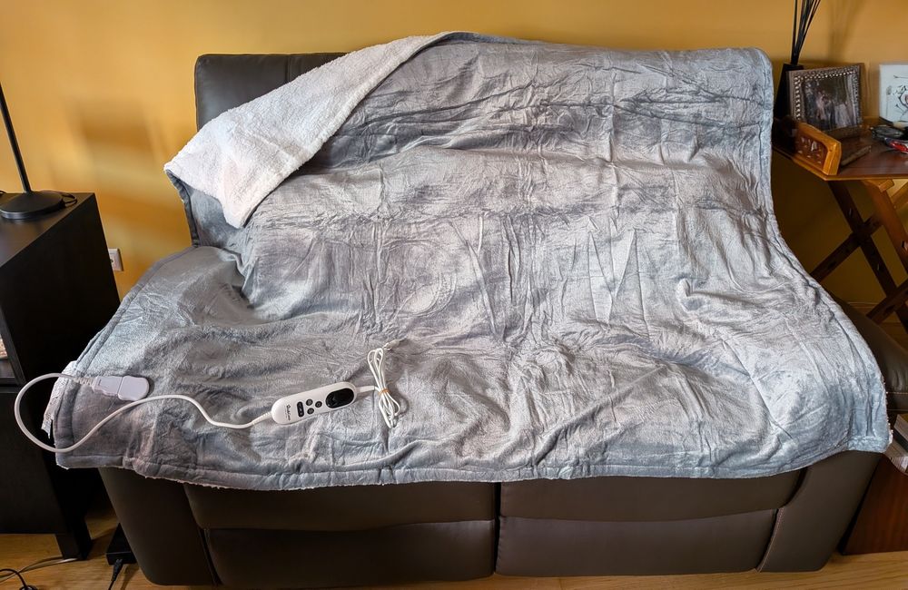 Cobertor elétrico cinzento aconchegante