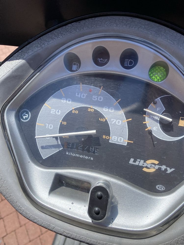 Скутер piaggio 4т