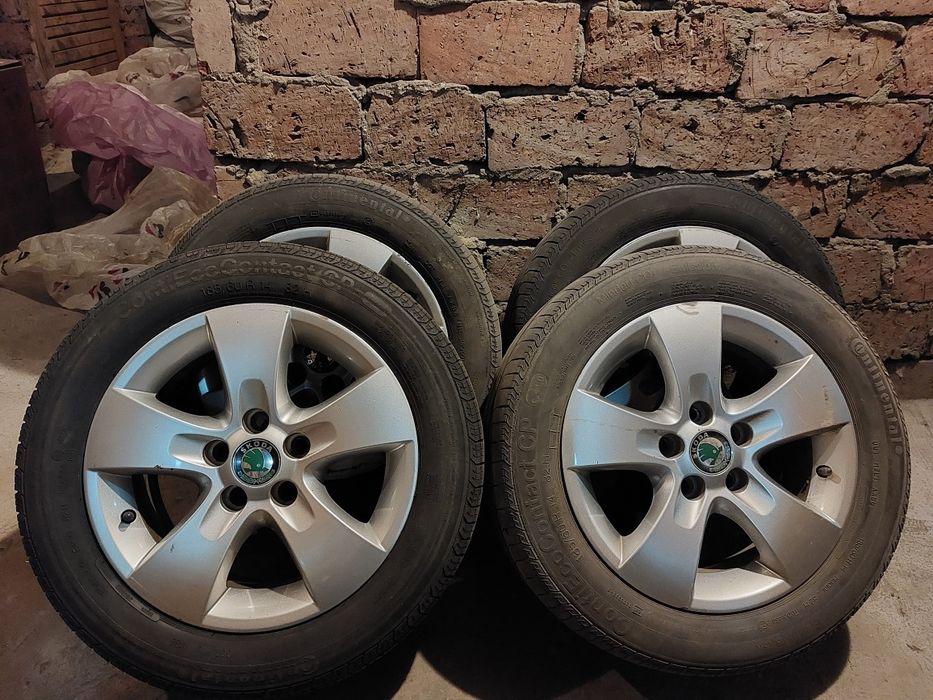 Felgi R14 5x100 6.0Jx14 H2 z oponami letnimi 185/60 Continental