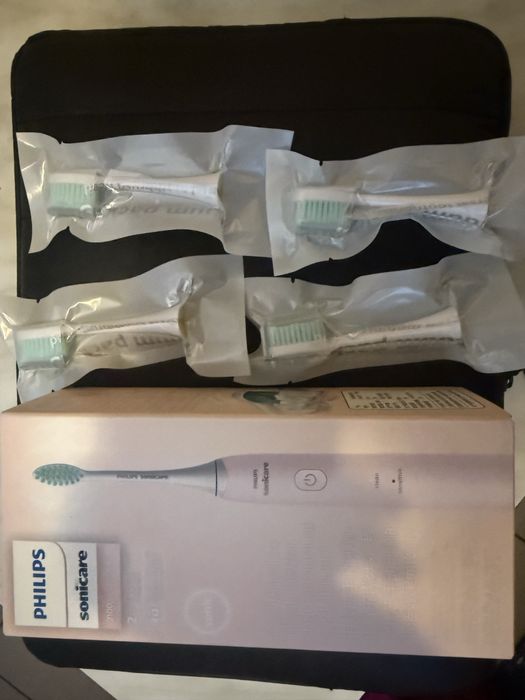 Зубна щітка Philips conicare з 4 додатковими насадками