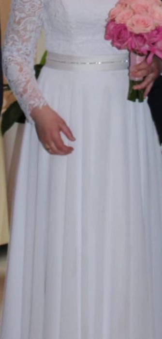 Piękna biała suknia ślubna długi koronkowyrękaw