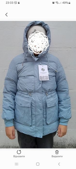 Зимова куртка на дівчинку підлітка