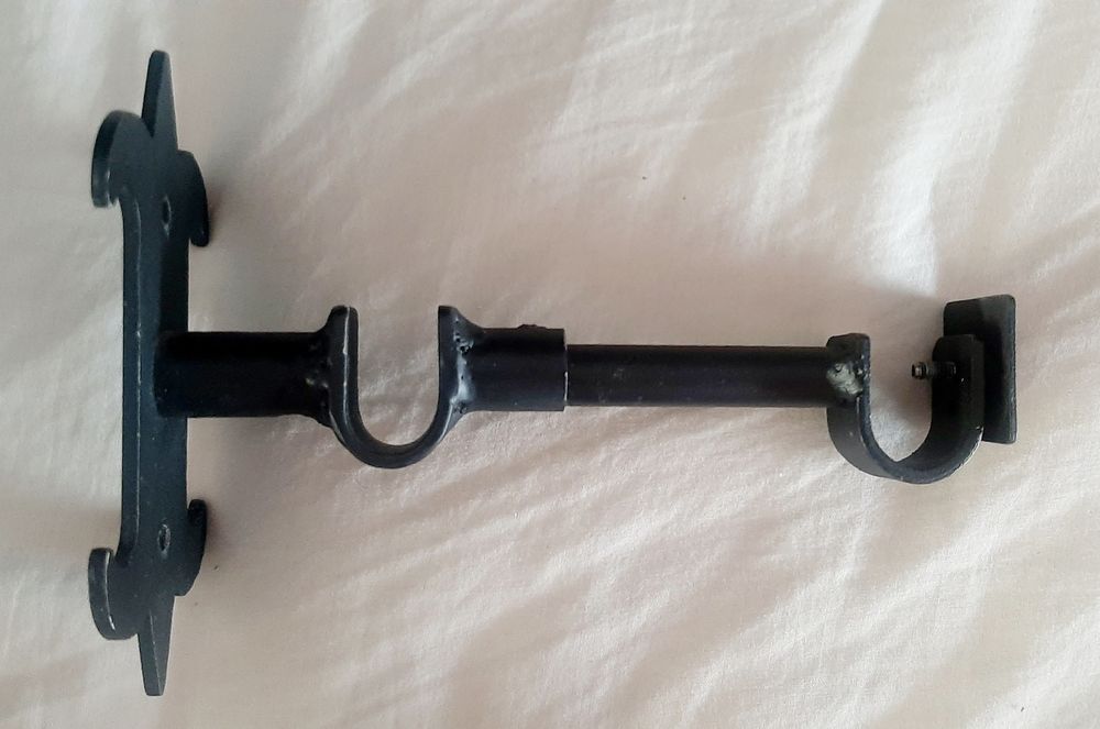 Suportes duplos de varão para cortinas