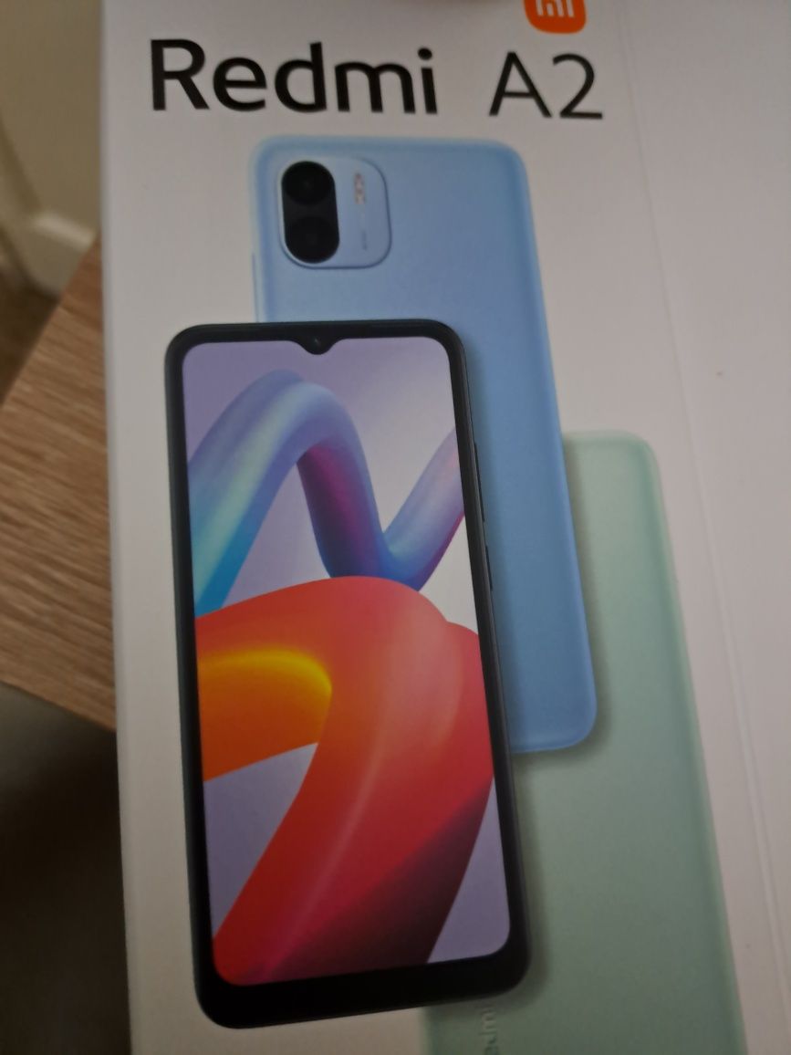 Smartphone xiaomi redmi A2 verde com capa da mesma cor