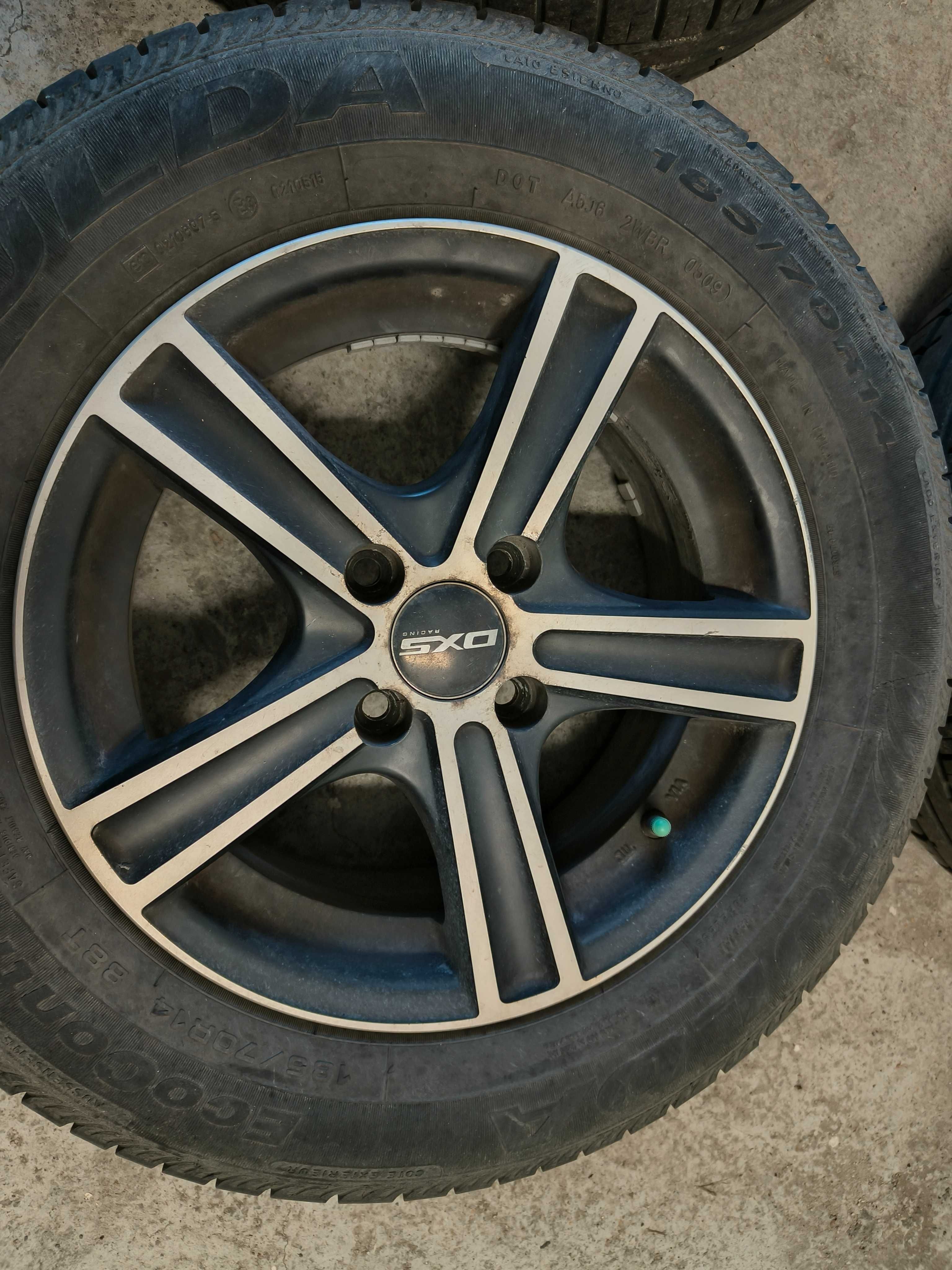Felgi aluminiowe DXS 14 4x100 średnica 67,1 Honda plus opony