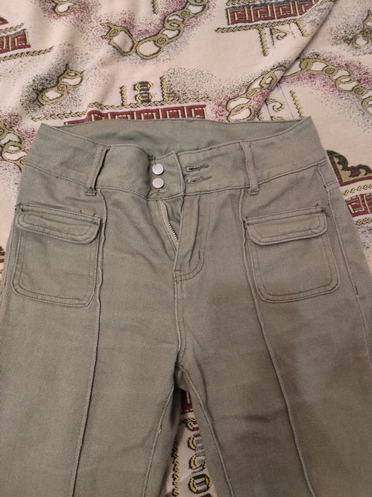 Оливкові клеш штани