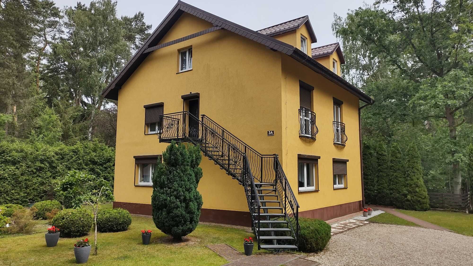 Pokoje Gościnne POD LASEM Pogorzelica