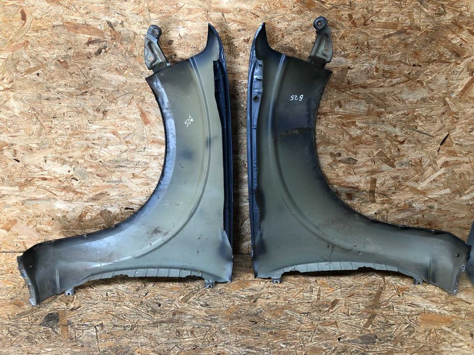 Błotnik przedni lewy prawy Pathfinder/Navara lift kolor b25