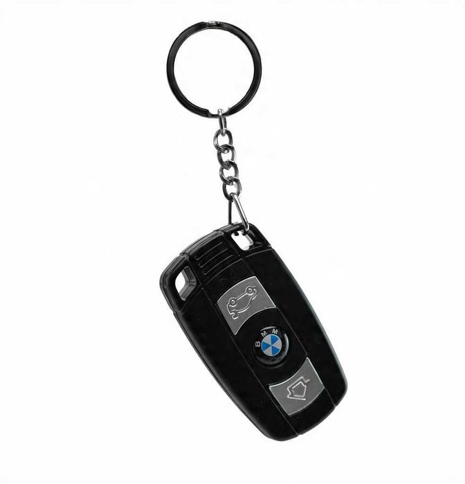 Brelok Kluczyk Samochodowy Auto Pilot Shock Kopie Prądem Latarka Laser