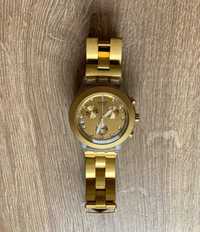 Złoty zegarek Swatch