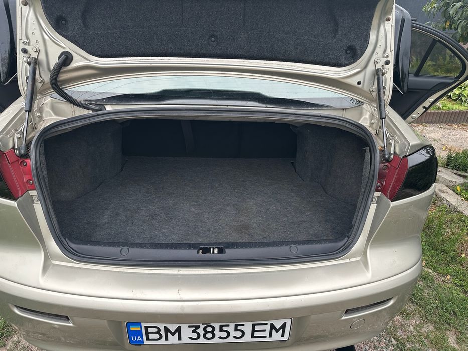 Mitsubishi lancer х 10.   1.5 газ/бензин