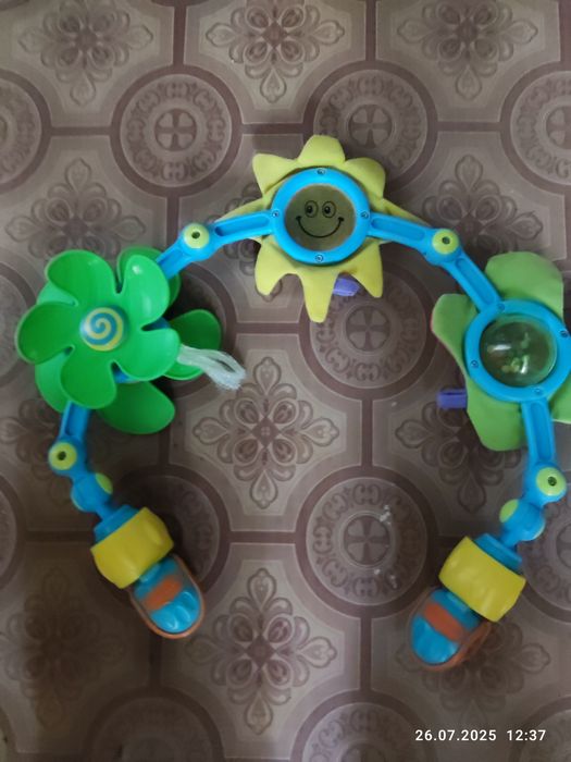 Дитяча іграшка на коляску