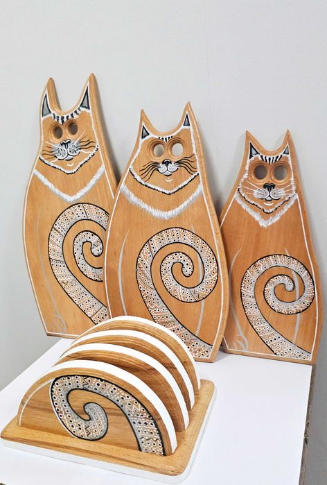 Na prezent koty na deskach