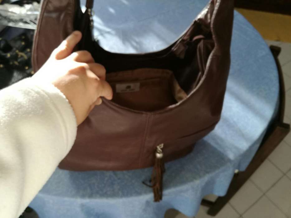 Carteira grande de mulher usada