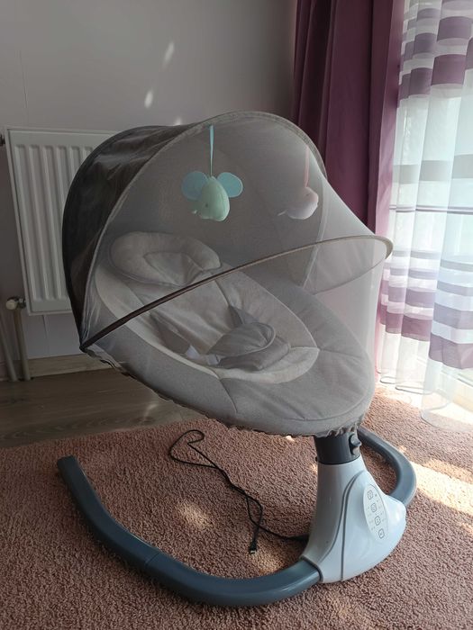 Дитяча електрична гойдалка