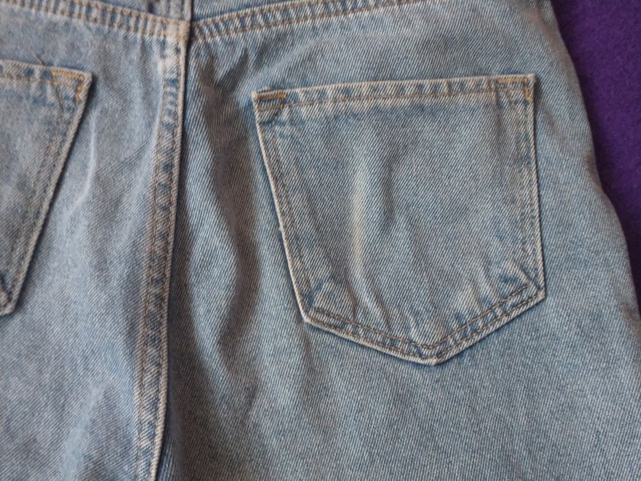 Spodnie jeansowe z dziurami i przetarciami wysoki stan Zero r. 36