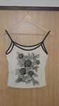 Top de senhora preto e branco com flores Adrenalina