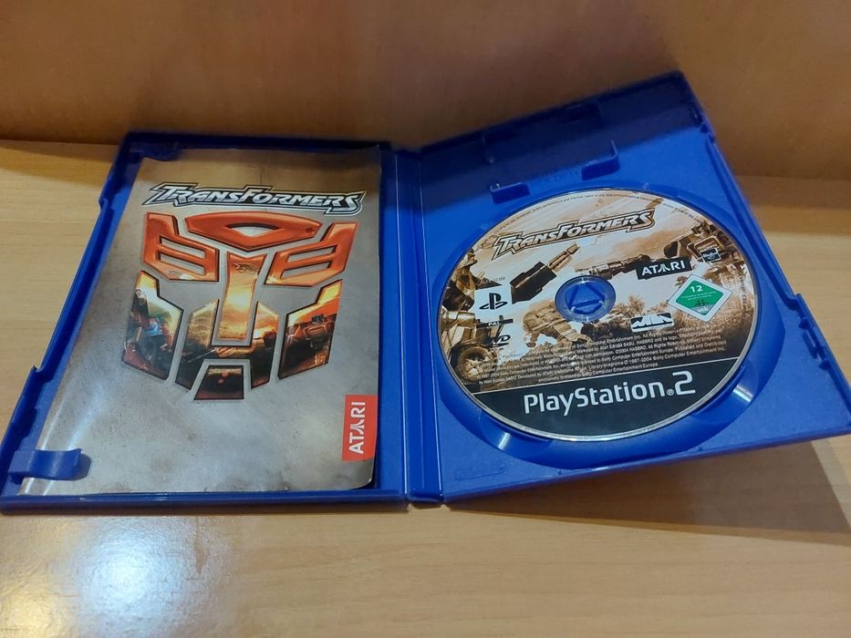 Jogo PS2 ( PlayStation 2 ) Transformers 2004 (Opt. Estado)