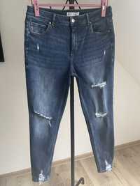 Elastyczne jeansy rurki z dziurami Denim Co r.44