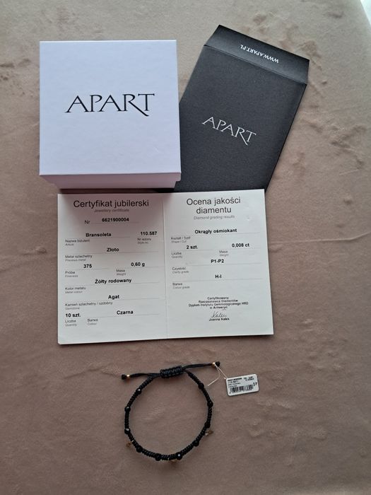 Bransoletka _ złoto, brylanty, kamienie naturalne, sznurek