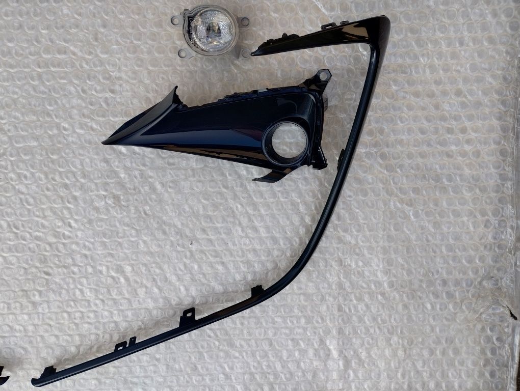 Corolla e21 ramka listwa halogen zderzaka przedniego
